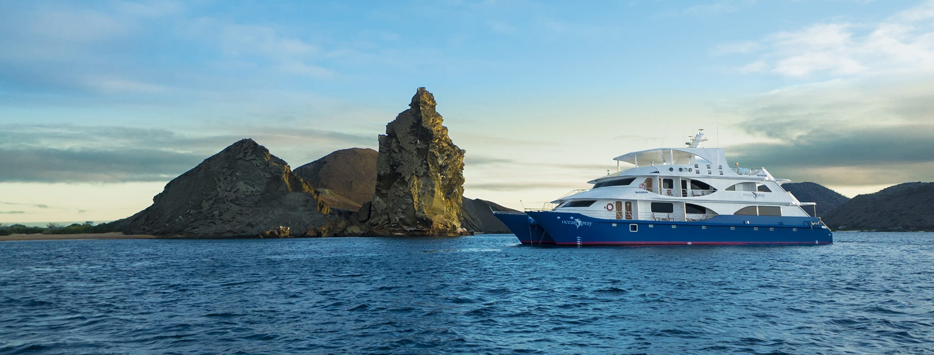 Galapagos Luxury Cruises / adventure with Columbus Travel / luxury Galapagos cruises: exclusive yachts, catamarans, and cruise ships / Galapagos Islands / coast of Ecuador / luxurious accommodations / luxury packages / private yacht charters to eco-friendly catamaran cruises, Columbus Travel / Your Galapagos adventure begins here.