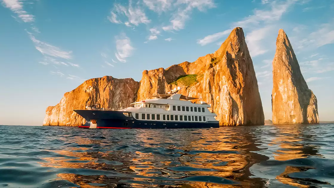 What is Better for Your Trip: Boutique Expedition Ships vs Elite Catamarans? - Origin Cruise - Galapagos FAQs - Galapagos Luxury Cruises / adventure with Columbus Travel / luxury Galapagos cruises: exclusive yachts, catamarans, and cruise ships / Galapagos Islands / coast of Ecuador / luxurious accommodations / luxury packages / private yacht charters to eco-friendly catamaran cruises, Columbus Travel / Your Galapagos adventure begins here.
